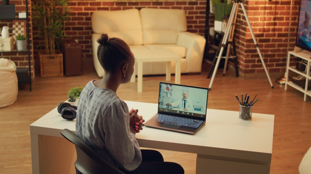 Woman using telehealth videocall